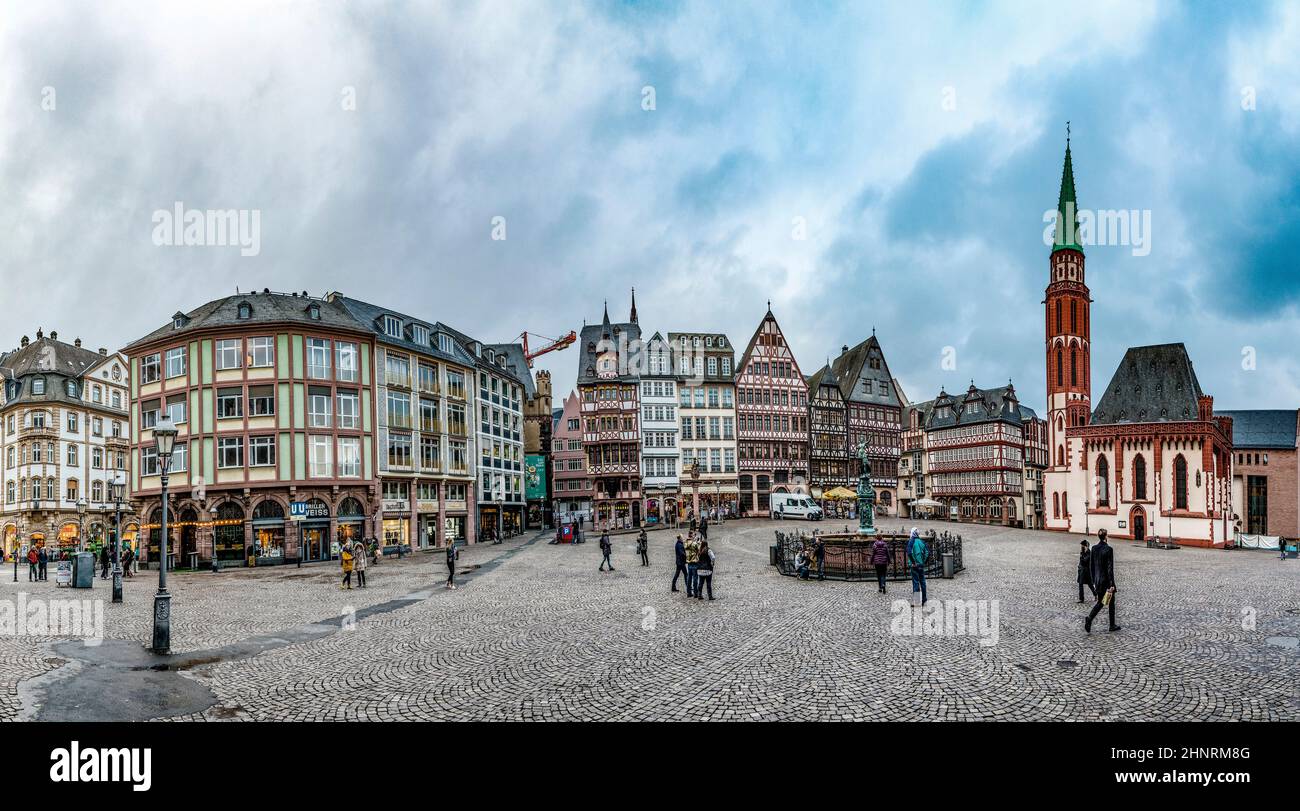 people visit the Roemerberg, the main market place at historic Frankfurt Stock Photo
