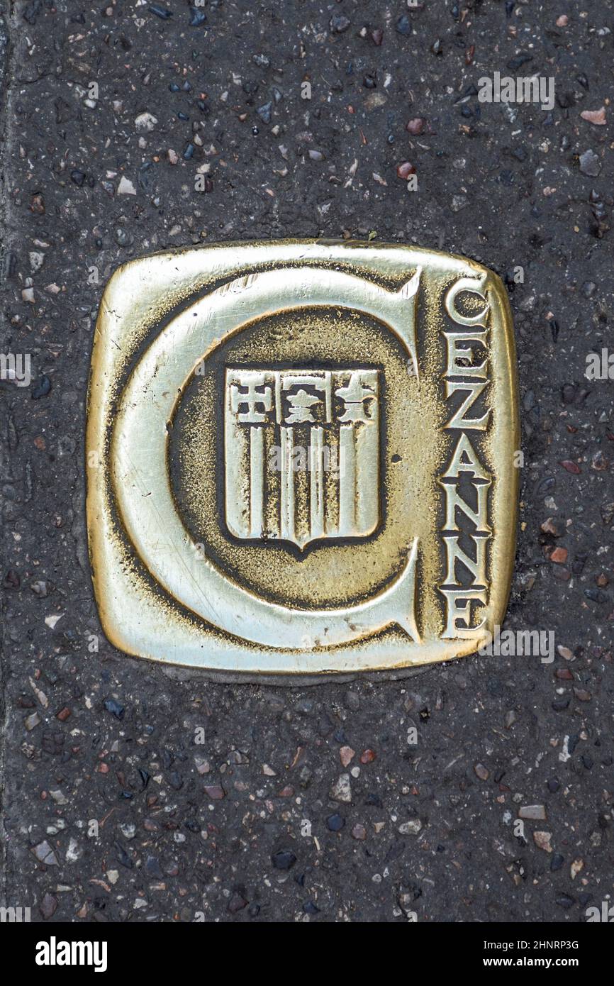 metal cobble stone in the pedestrian zone in Aix to mark the way Cezanne was going Stock Photo