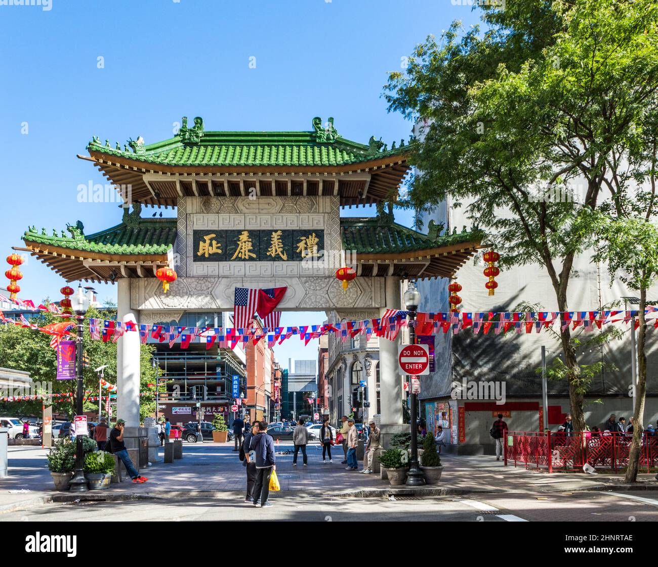 streetlife in China town in Boston. This area is one of the oldest China Towns in the US and peope enter through a chinese gate Stock Photo