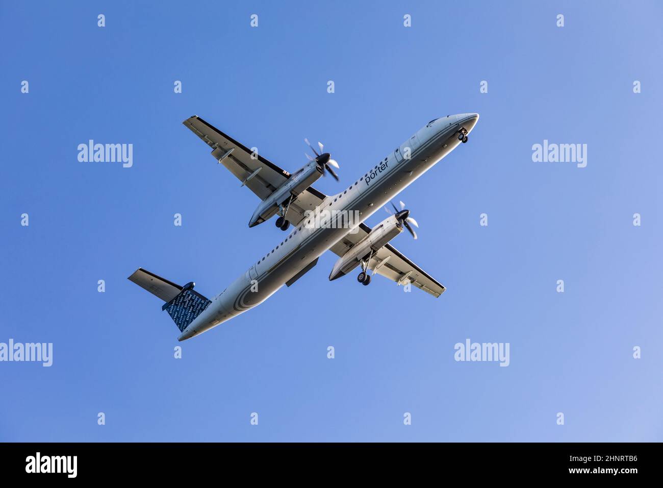 porter aircraft in landing approach to Boston airport Stock Photo