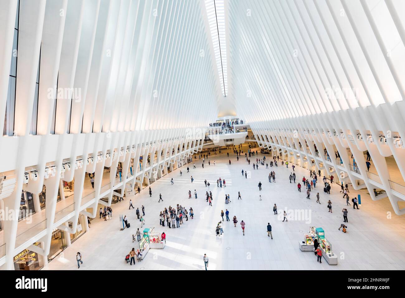 Oculus interior of the white World Trade Center station with people in New York Stock Photo