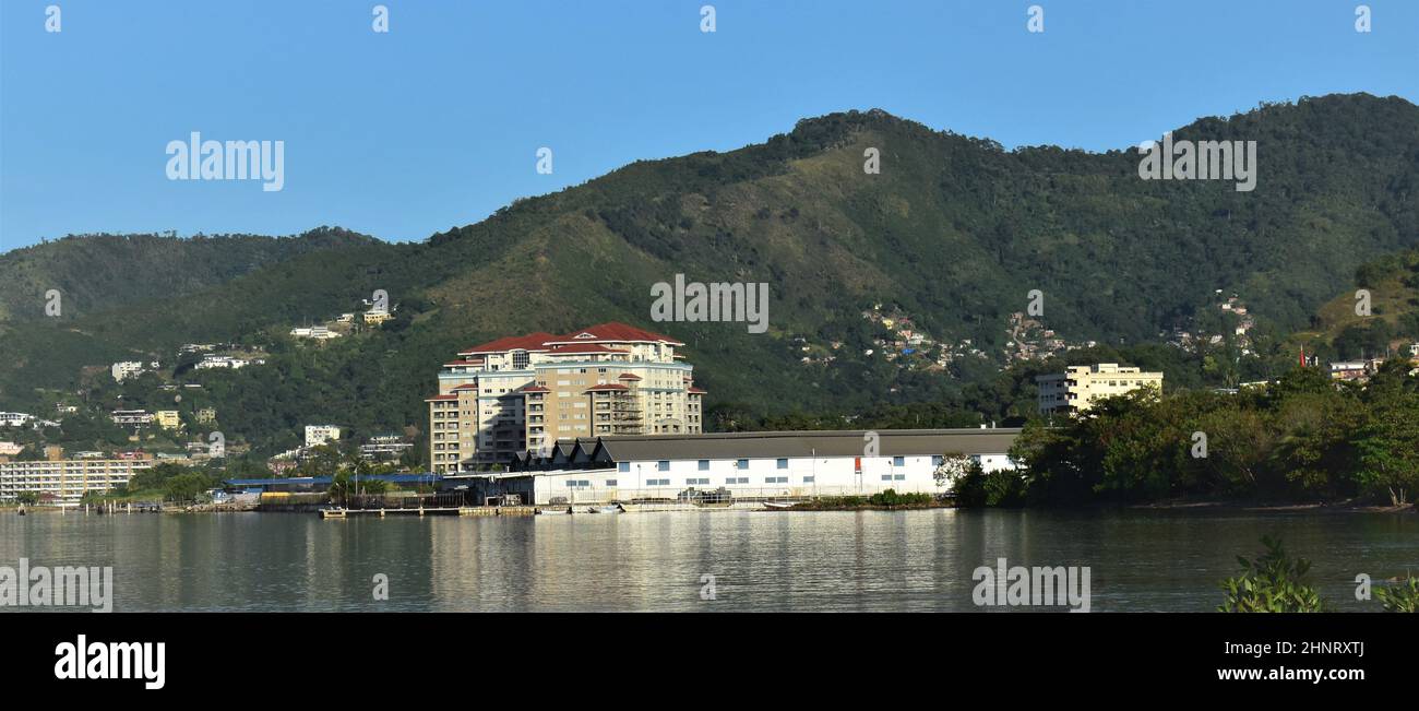 Mucurapo, Trinidad and Tobago-January 16, 2021: Early morning view from the Mucurapo foreshore. Several commercial buildings can be seen Stock Photo