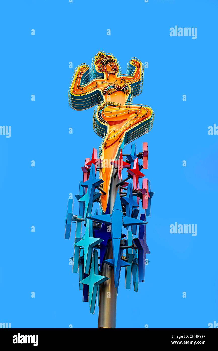 Iconic Fremont Street in 'Old Las Vegas' features historic casinos, bars, neon signs, and hotels that continue to attract tourists from around the globe. Stock Photo