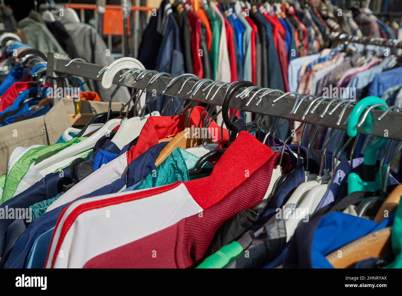 Selling used clothes at a market Stock Photo