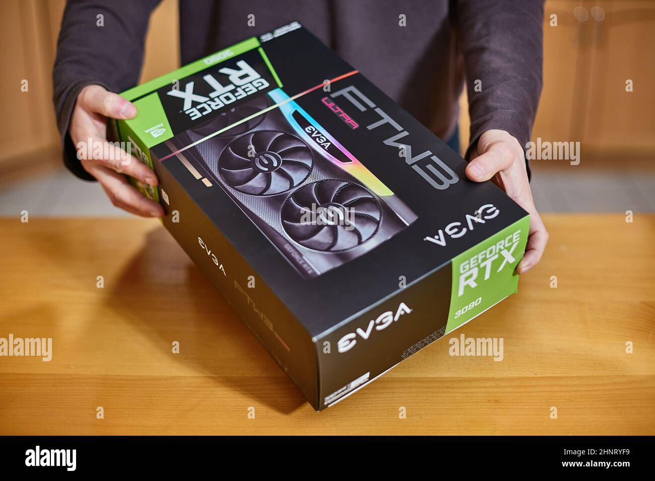Buying EVGA Geforce RTX 3090 Nvidia GPU in a shop Stock Photo