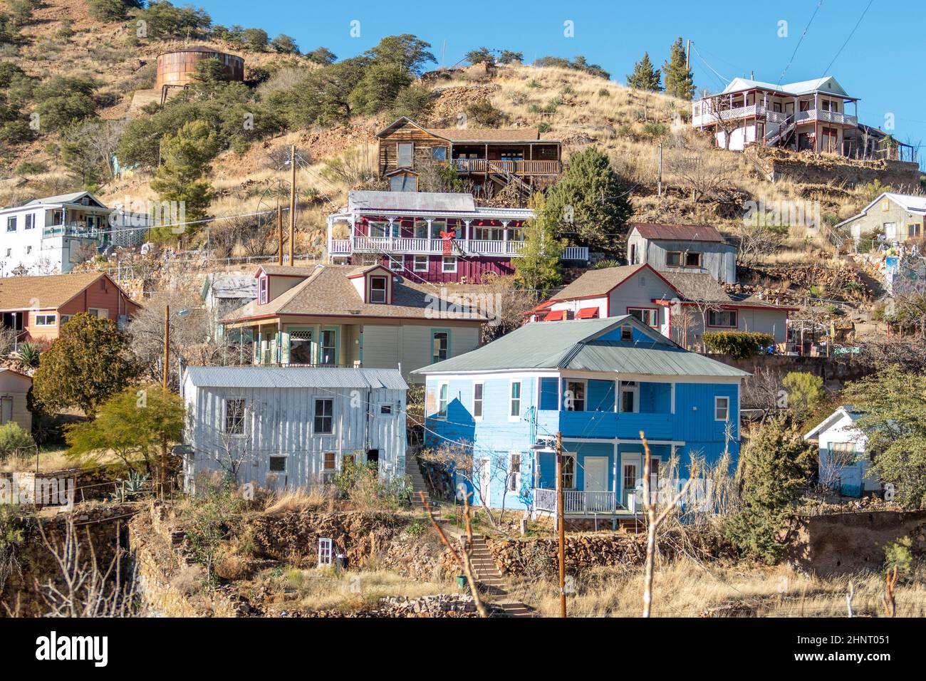 Buildings in the hills on a clear day at the edge of Bisbee, Arizona. Stock Photo