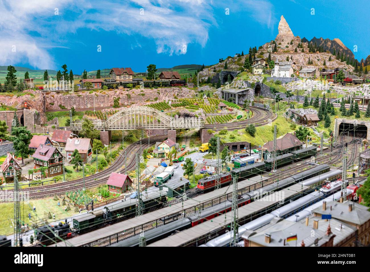 detail of model railway with landscape, villages and operating train