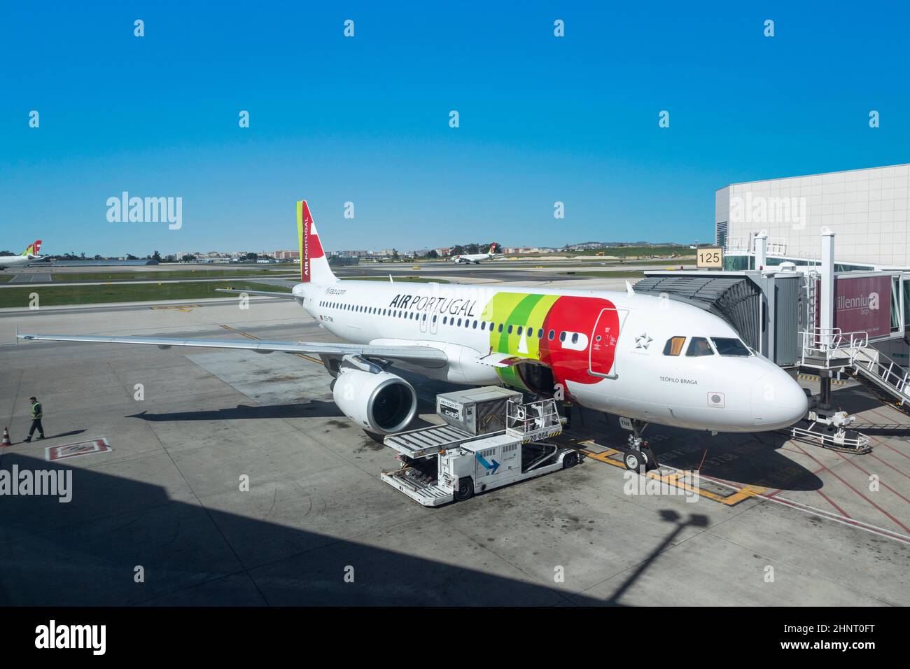 TAP aircraft at the gate ready for boarding at Lisbon airport Humberto Delgado Stock Photo