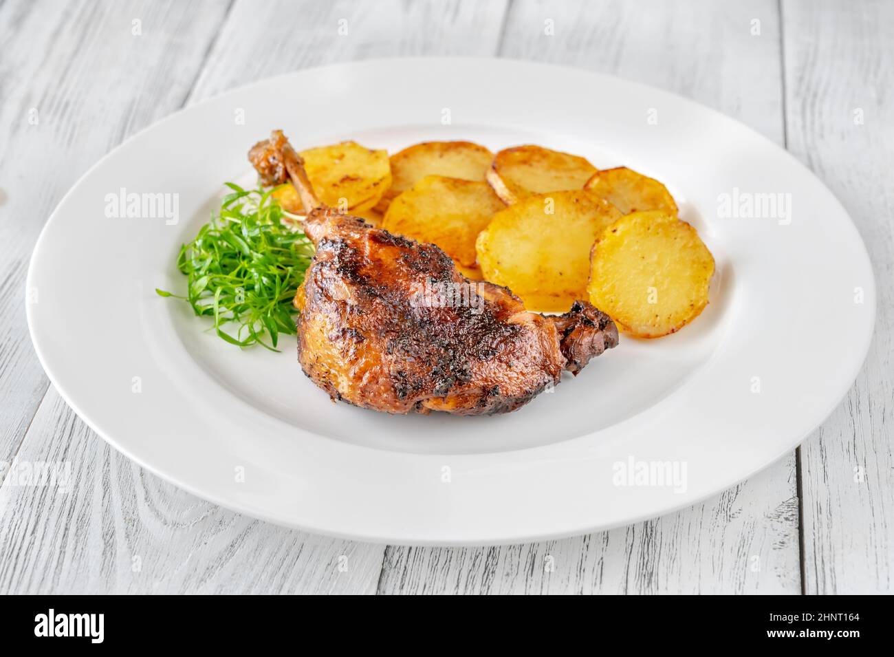 Duck Confit - a French dish made with the duck legs Stock Photo