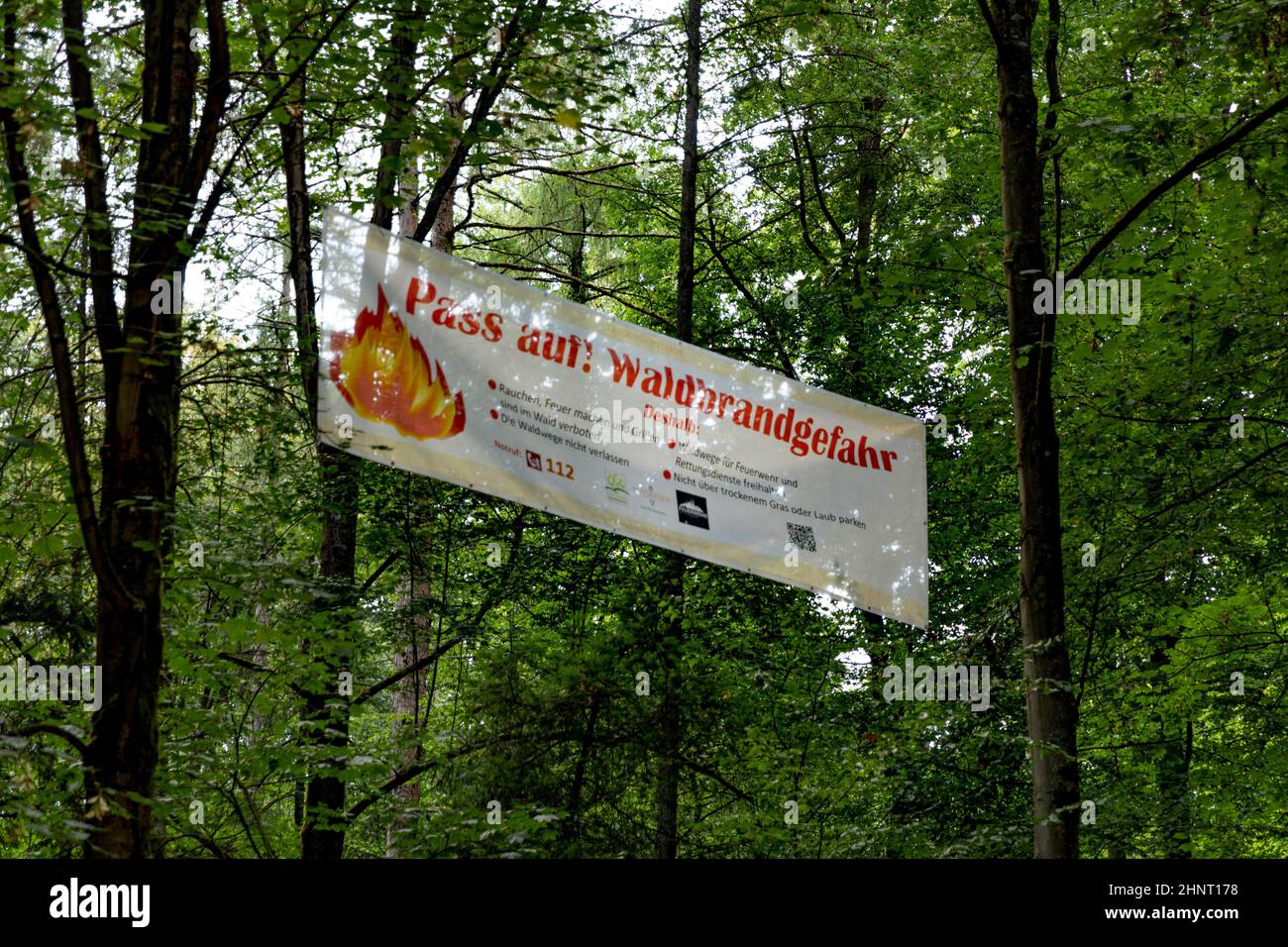 banner for warning of forest fire with advice to avoid open fire and contact information. Stock Photo