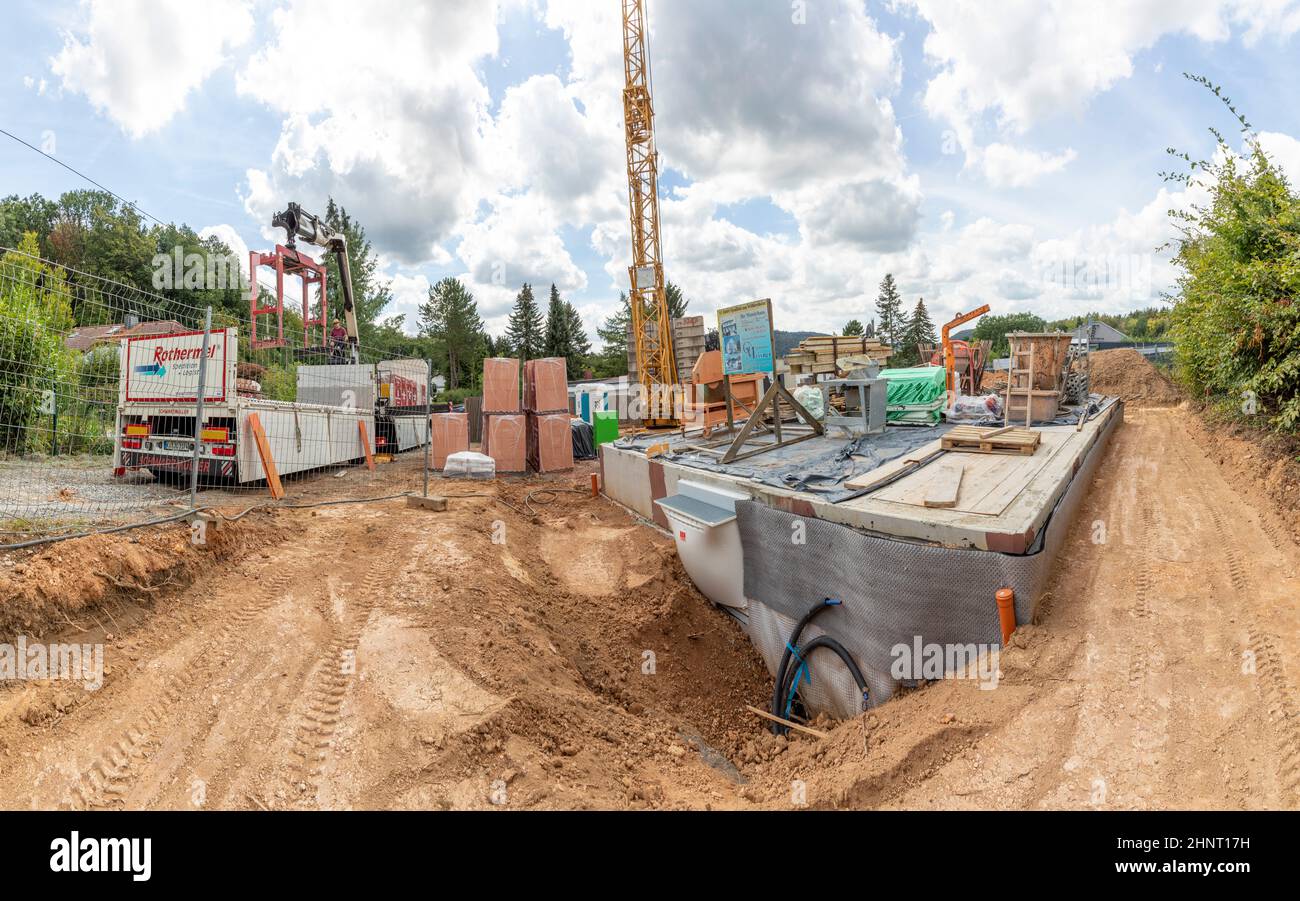 construction site of a one family house with raw bricks without exterior plaster Stock Photo