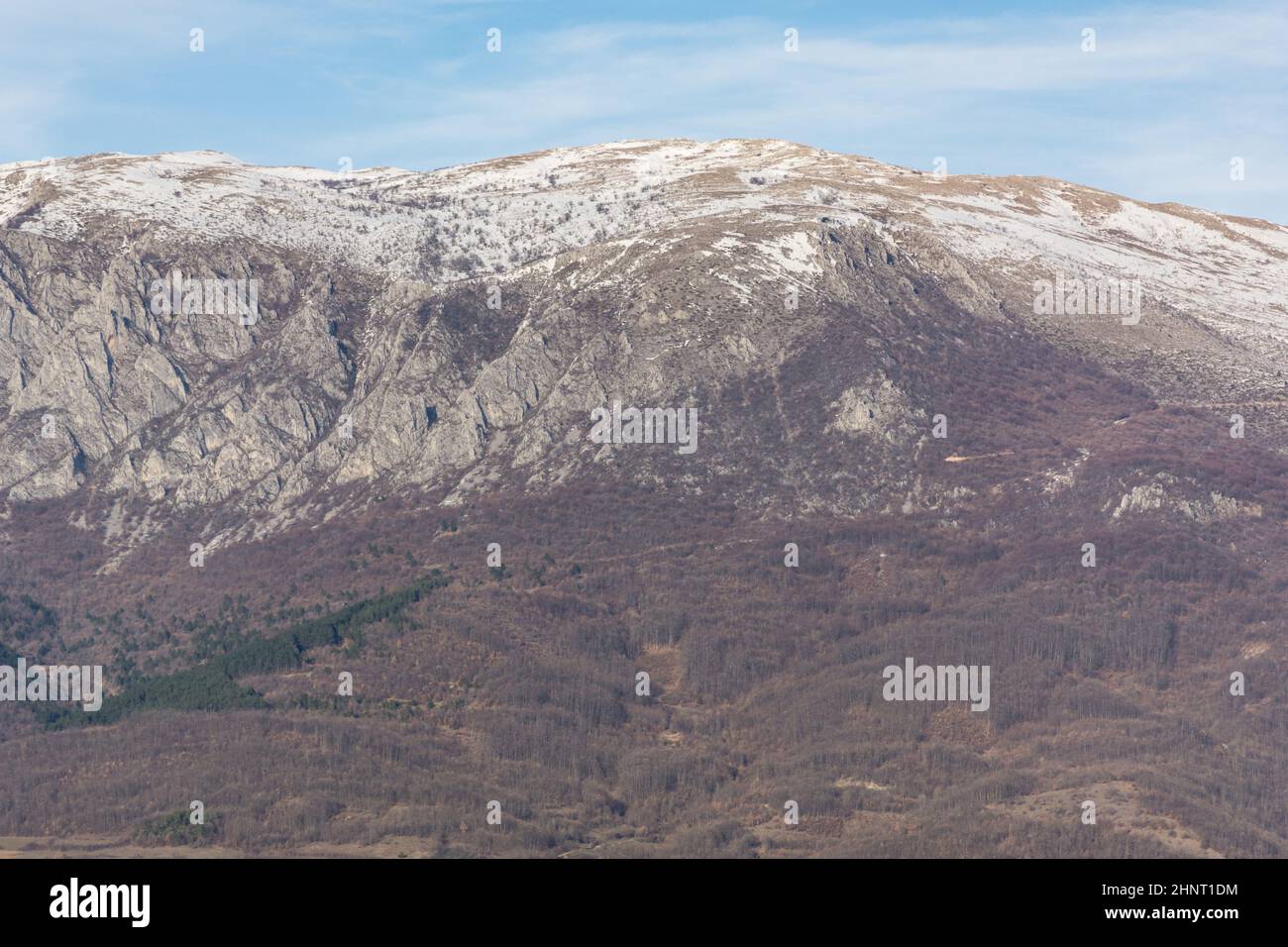 Beautiful closeup view of Suva Planina in Serbia on a winter day. The top of the mountain is covered with snow Stock Photo