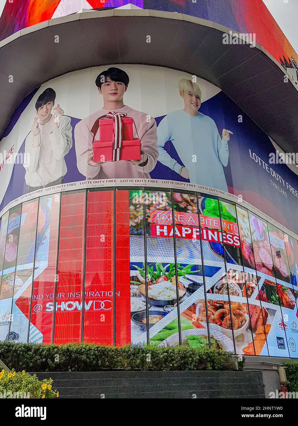 Huge colorful screens at the shopping center building Bangkok Thailand. Stock Photo