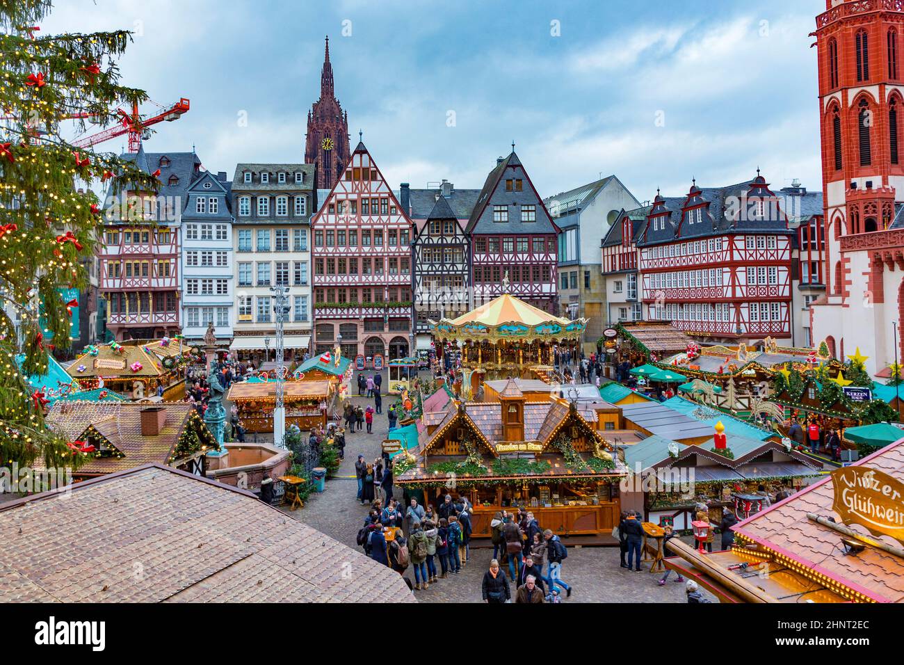 people enjoy the christmas market at the Roemer Stock Photo