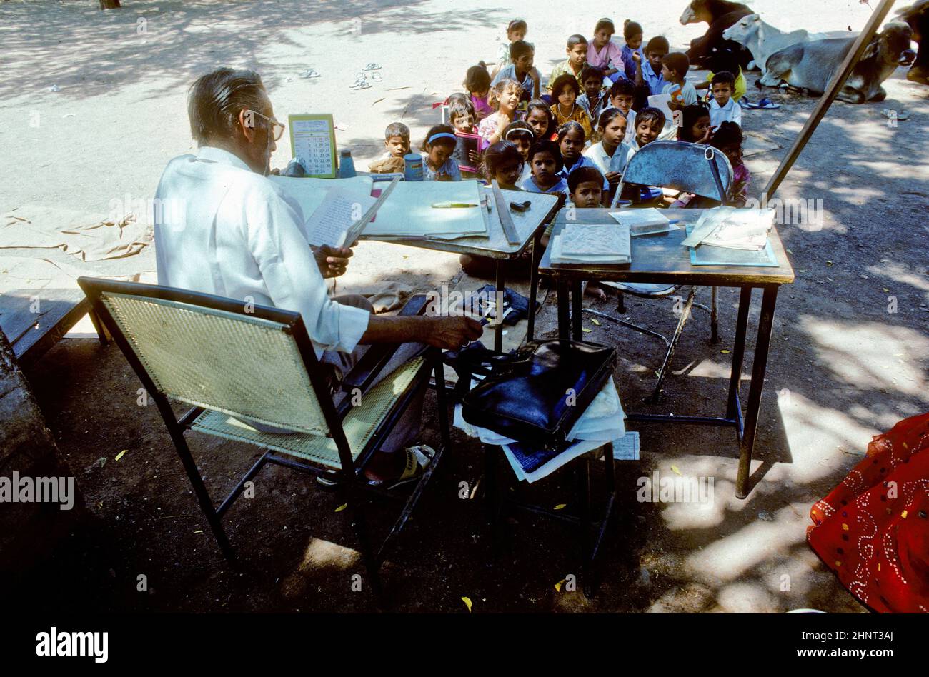 teacher teaches children in the outdoor classroom Stock Photo