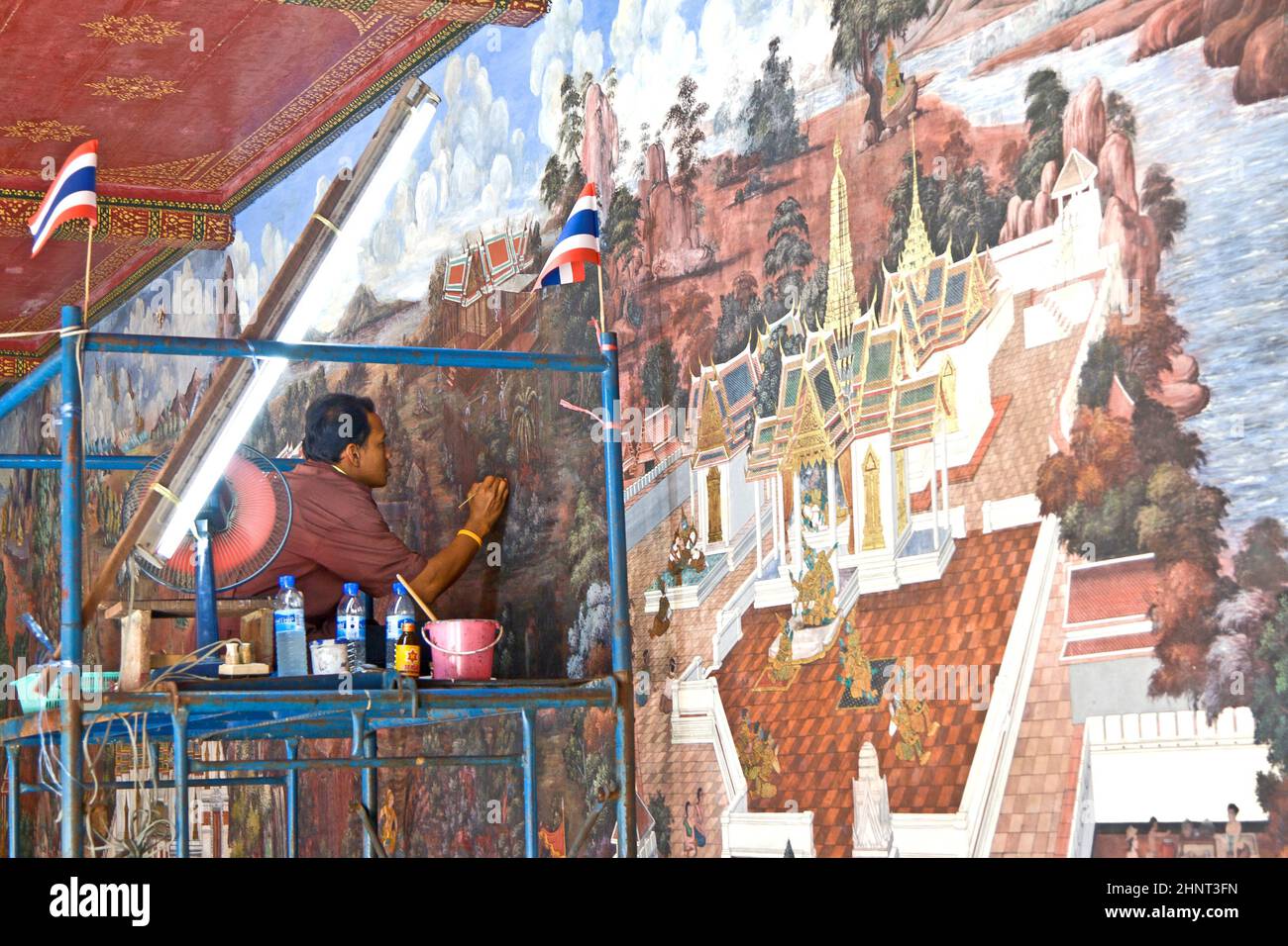 worker restores the famous paintings in the Grand Palace precisely Stock Photo