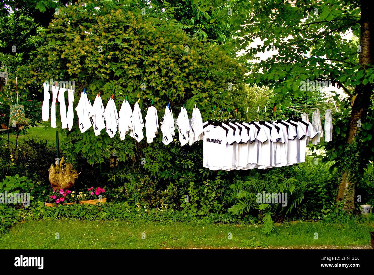 tricots of Children E-Class are drying in the sun Stock Photo