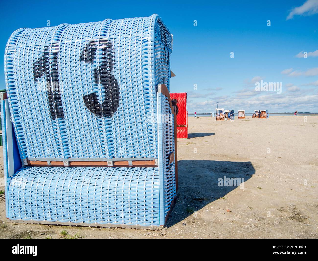 Blue beach chair rear view Stock Photo - Alamy