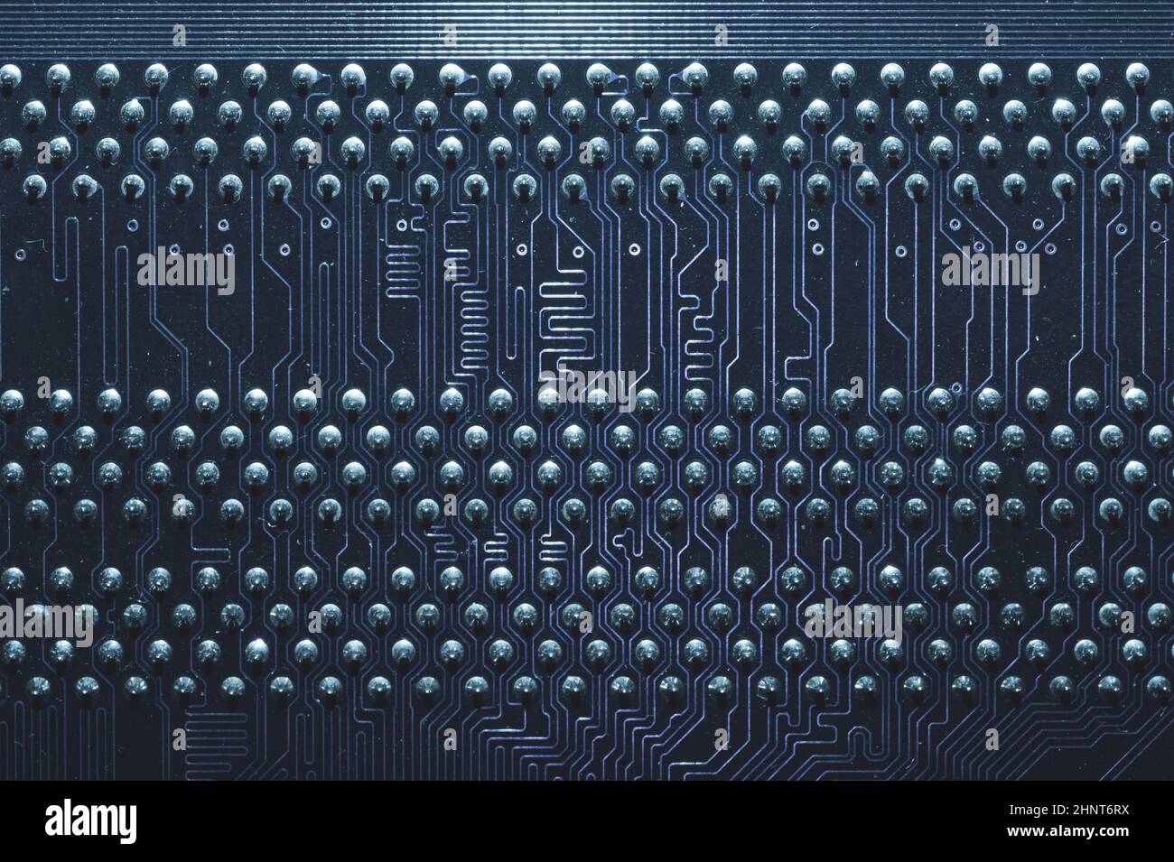 Dusty circuit board abstract background. computer motherboard close up