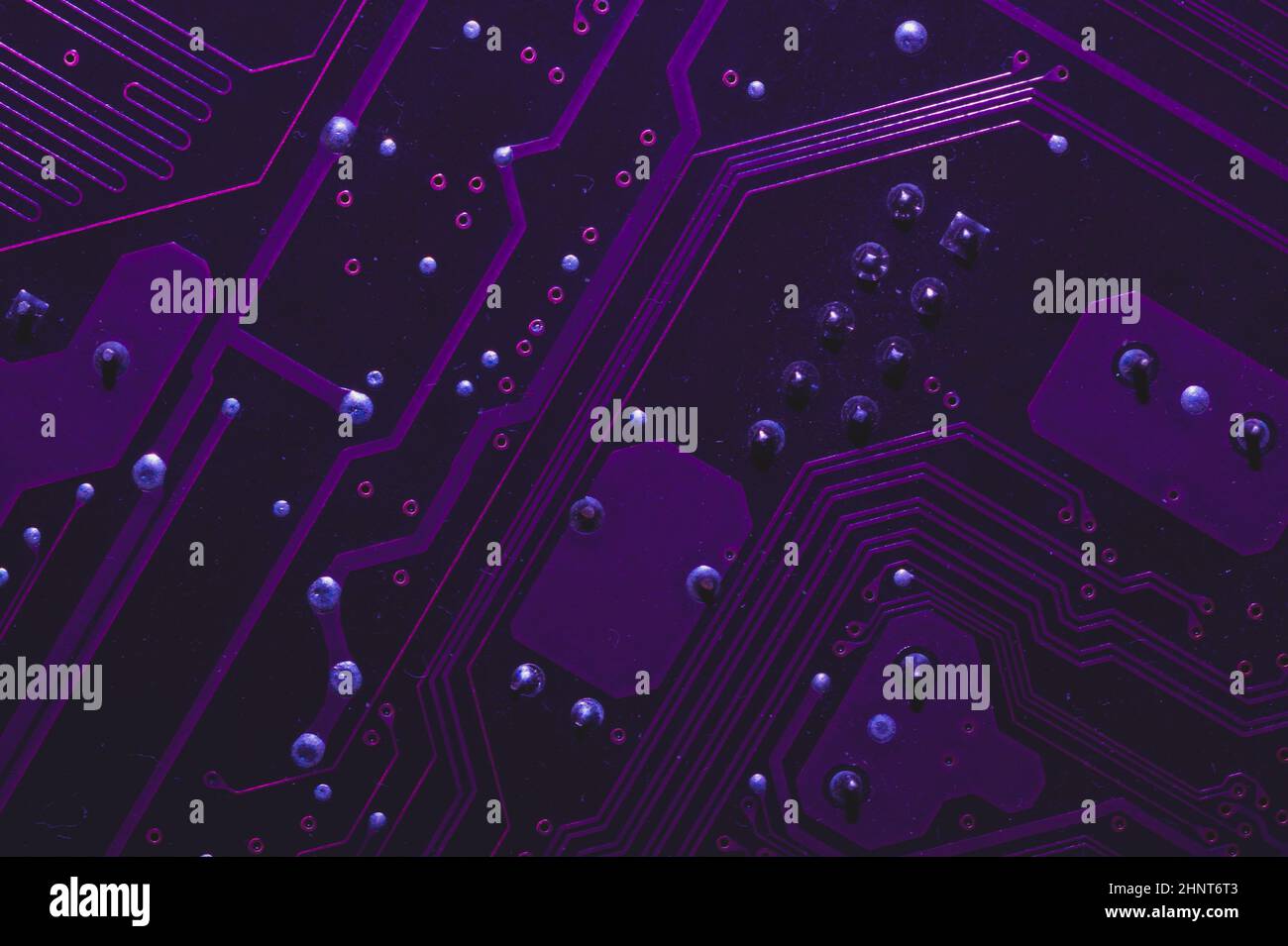 Dusty circuit board abstract background. computer motherboard close up