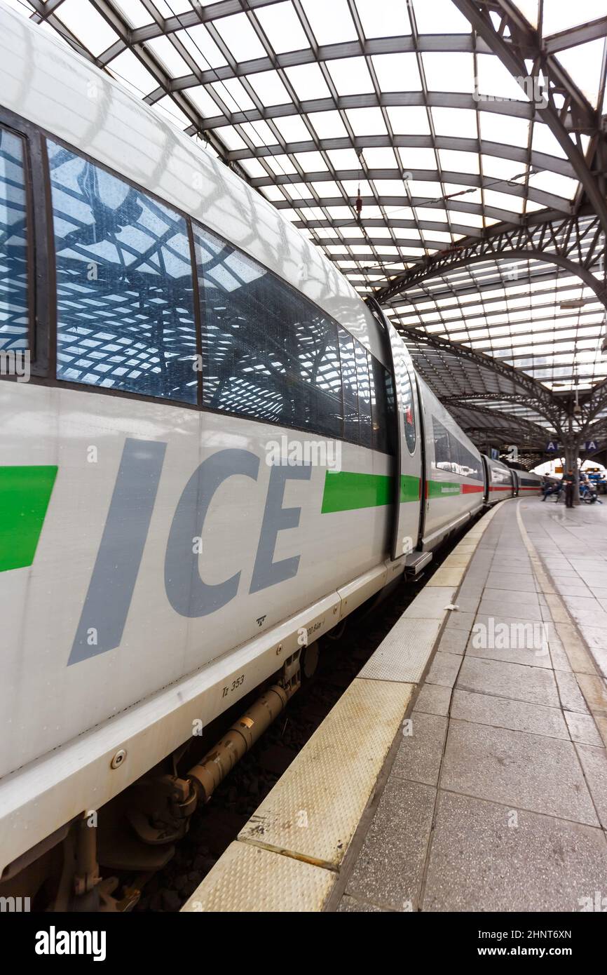 ICE 3 high-speed train at Cologne Köln main railway station Hauptbahnhof Hbf portrait format in Germany Stock Photo