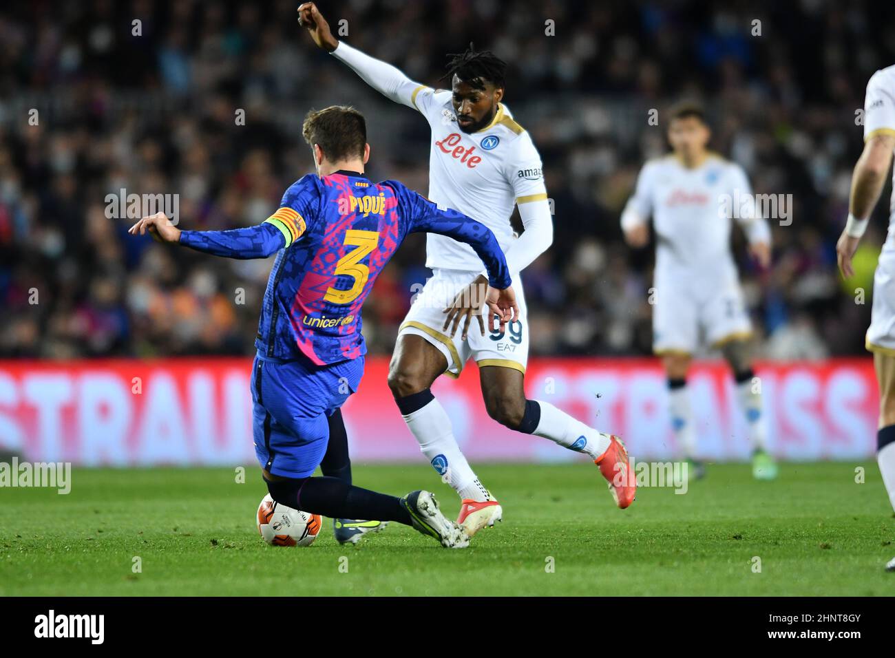 Barcelona,Spain.17 February,2022.  Gerard Pique (3) of FC Barcelona challenges (99) André-Frank Zambo Anguissa of Napoli during the Europa League match between FC Barcelona and SSC Napoli at Camp Nou Stadium. Credit: rosdemora/Alamy Live News Stock Photo