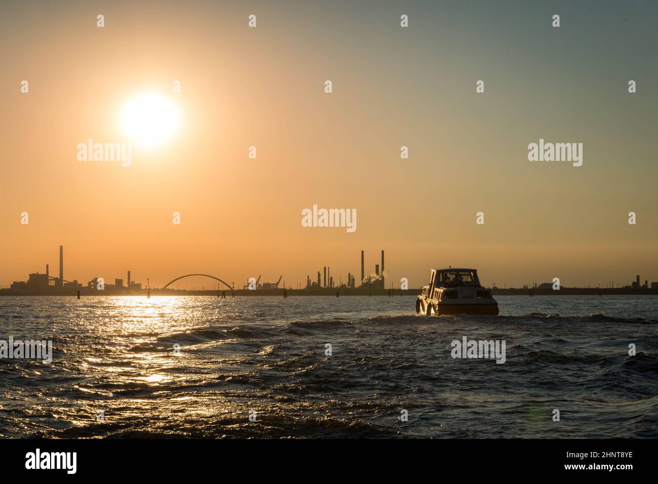 Silhouette industrial area at sunset, Marghera, Venice Stock Photo