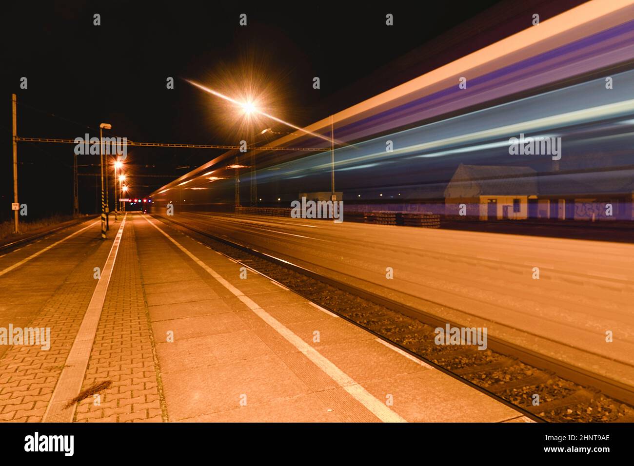 light-trail-of-the-express-train-in-the-railway-station-at-the-night