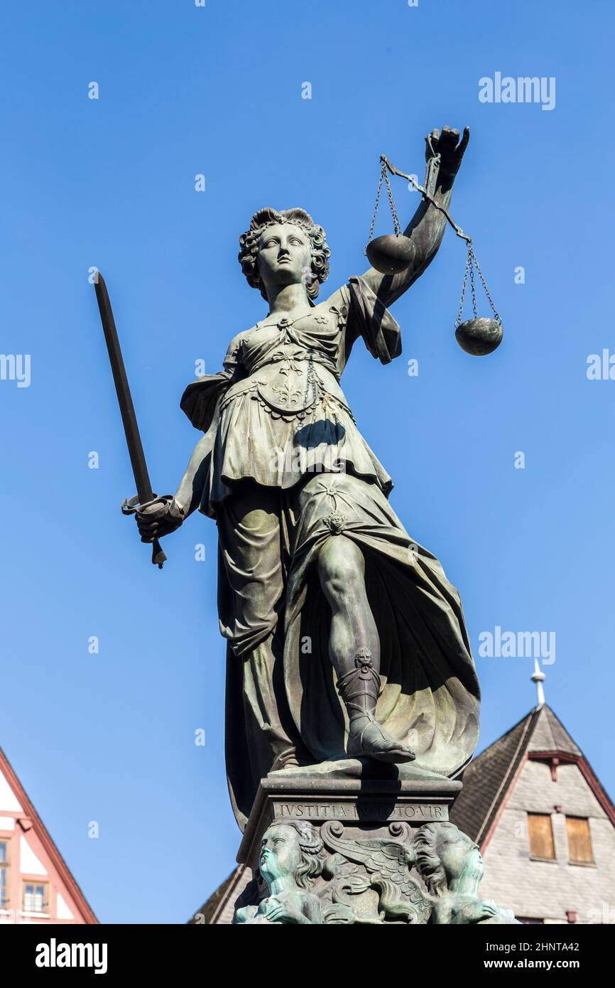Justitia (Lady Justice) sculpture on the Roemerberg square in Frankfurt