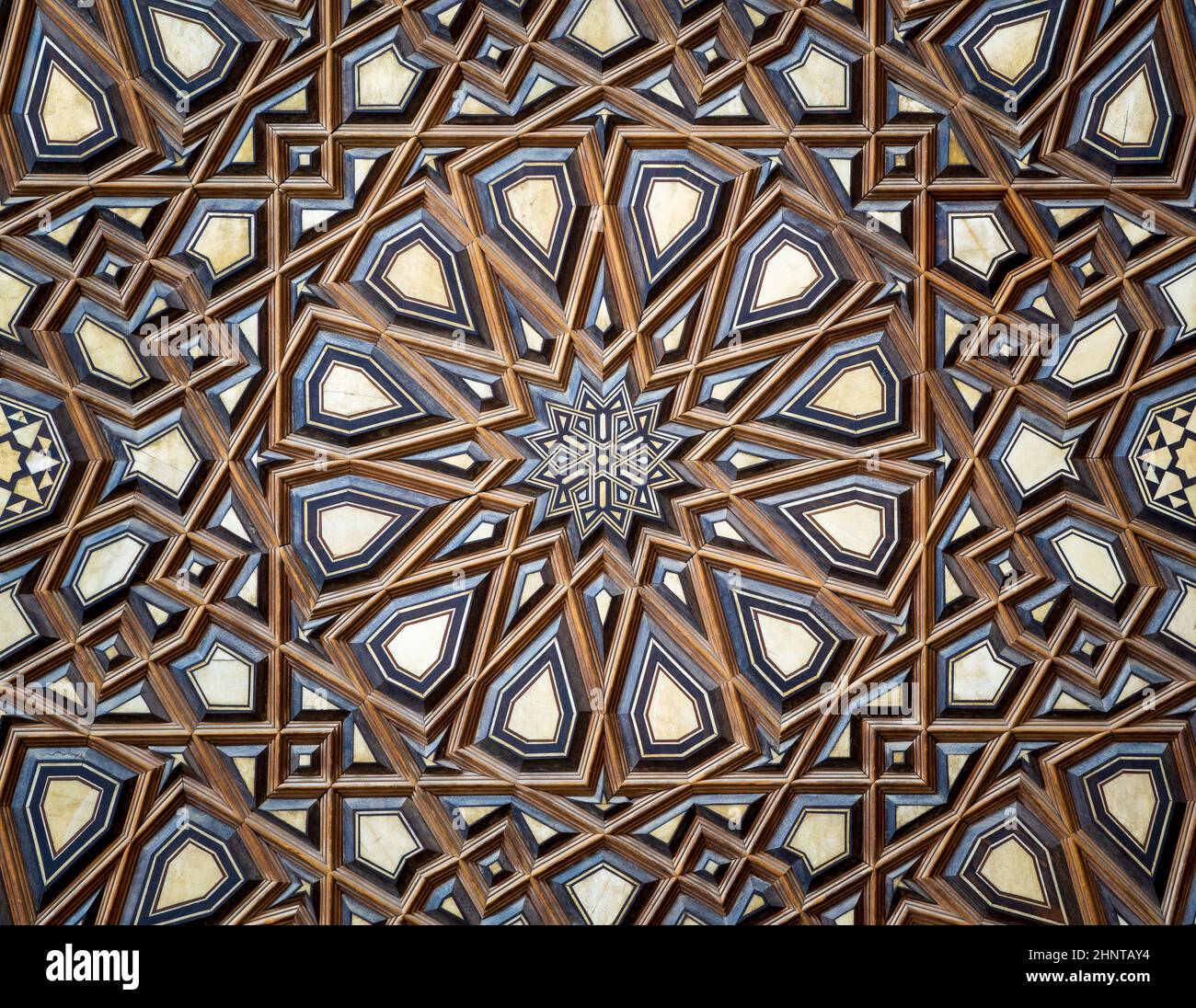 Arabesque decorations tongue and groove assembled, inlaid with ivory and ebony, on Minbar of Al Rifai Mosque, Cairo Stock Photo