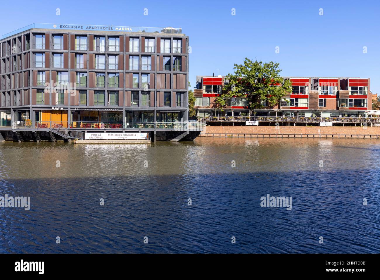 Modern apartment buildings on the bank of the river Odra on the island