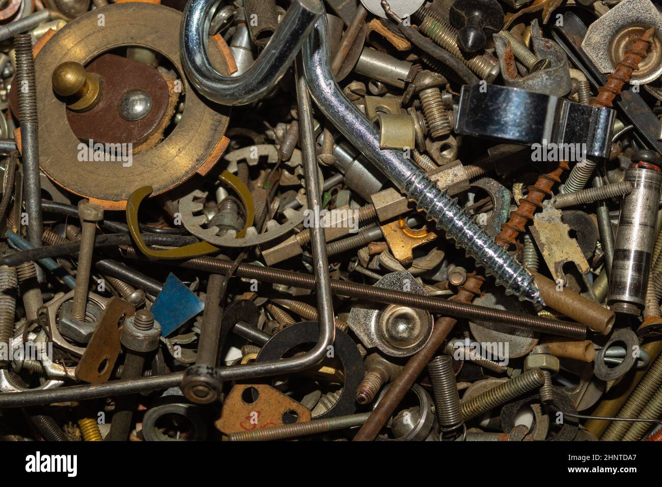 Old screws background. heap of tapping screws. work tool. pile of