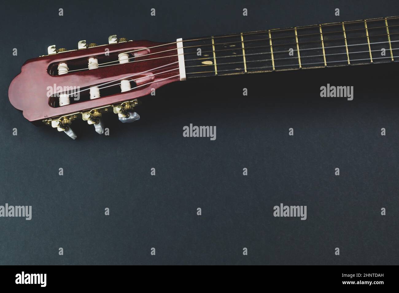 Guitar fretboard close up. musical instrument. strings on the guitar