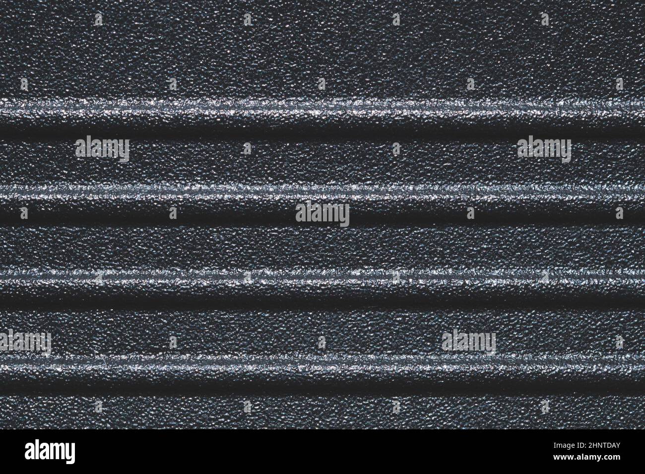 Black plastic texture. ribbed background Stock Photo