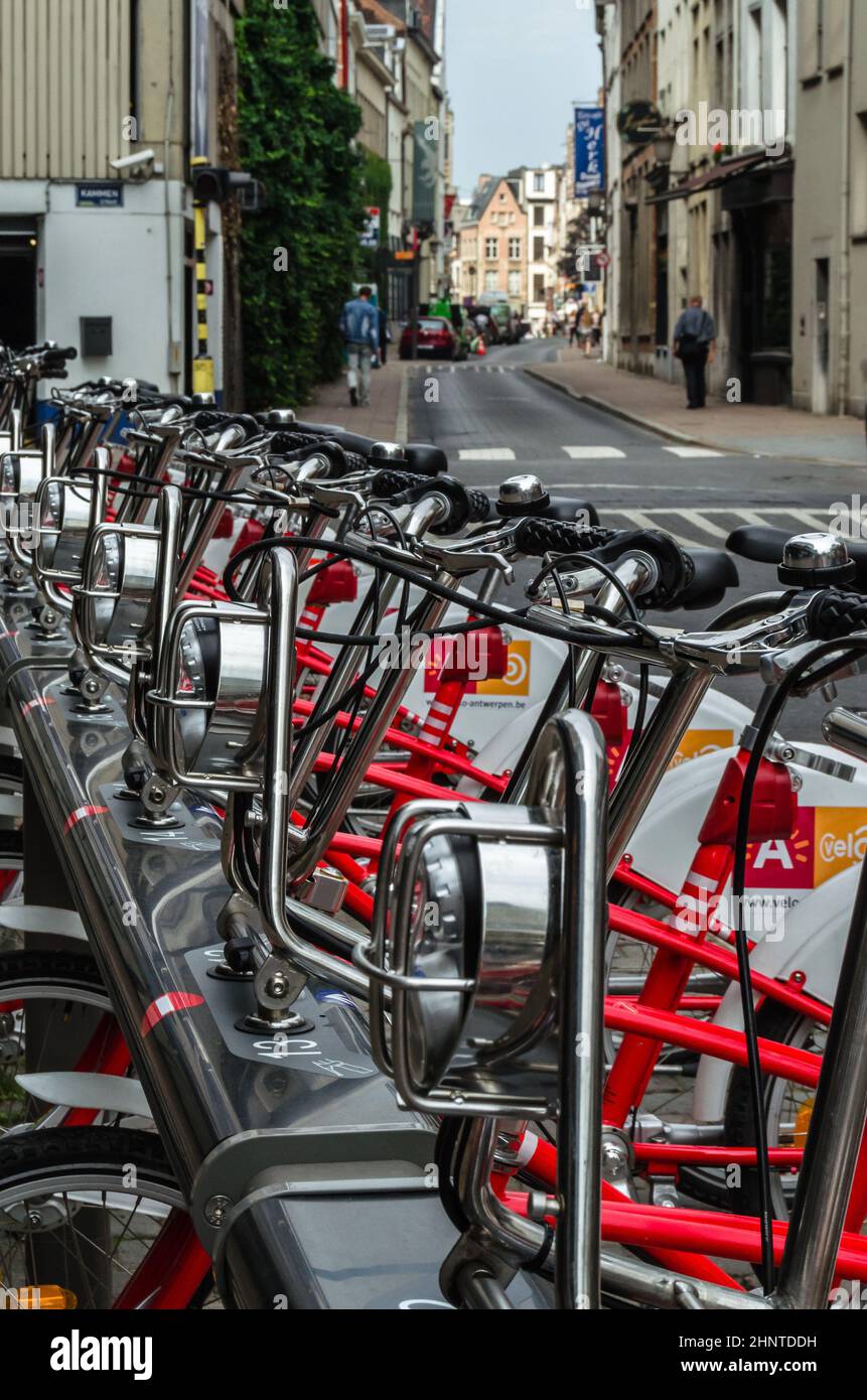 ANTWERP, BELGIUM - AUGUST 22, 2013:  Row of bicycles from the Velo company, a bike sharing service in Antwerp, Belgium Stock Photo