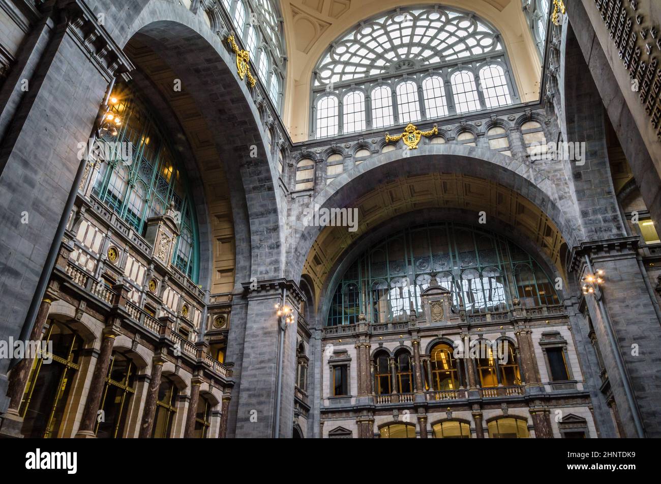 ANTWERP, BELGIUM - AUGUST 22, 2013: Beautiful interior of Antwerpen-Centraal, the main train station in the Belgian city of Antwerp. The station is colloquially known as the railroad cathedral Stock Photo