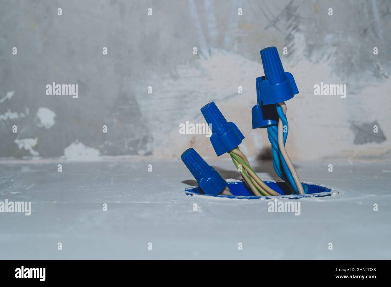 Unfinished electrical socket with electrical wires and connectors