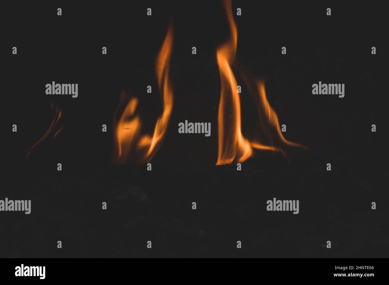 Burning wood in the fire. flame in the fireplace Stock Photo - Alamy