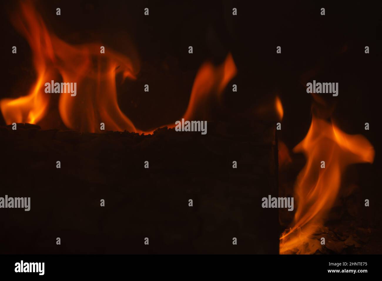 Burning wood in the fire. flame in the fireplace Stock Photo - Alamy