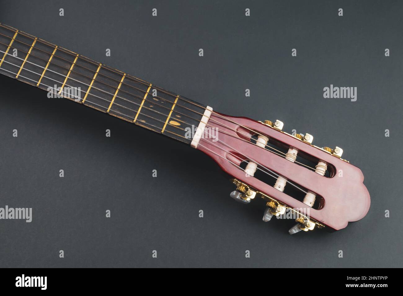 Guitar fretboard close up. musical instrument. strings on the guitar neck. copy space Stock