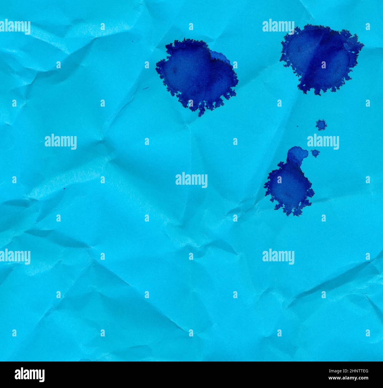 A blue ink blotch or ink stain on paper Stock Photo - Alamy