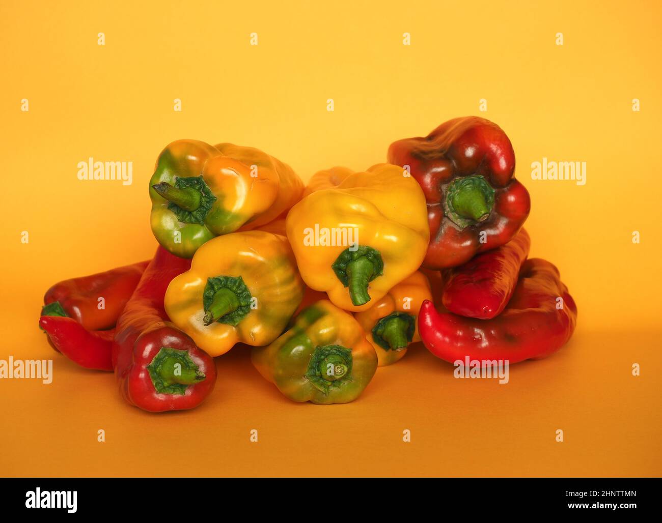 red and yellow peppers (scientific name Capsicum aka bell peppers