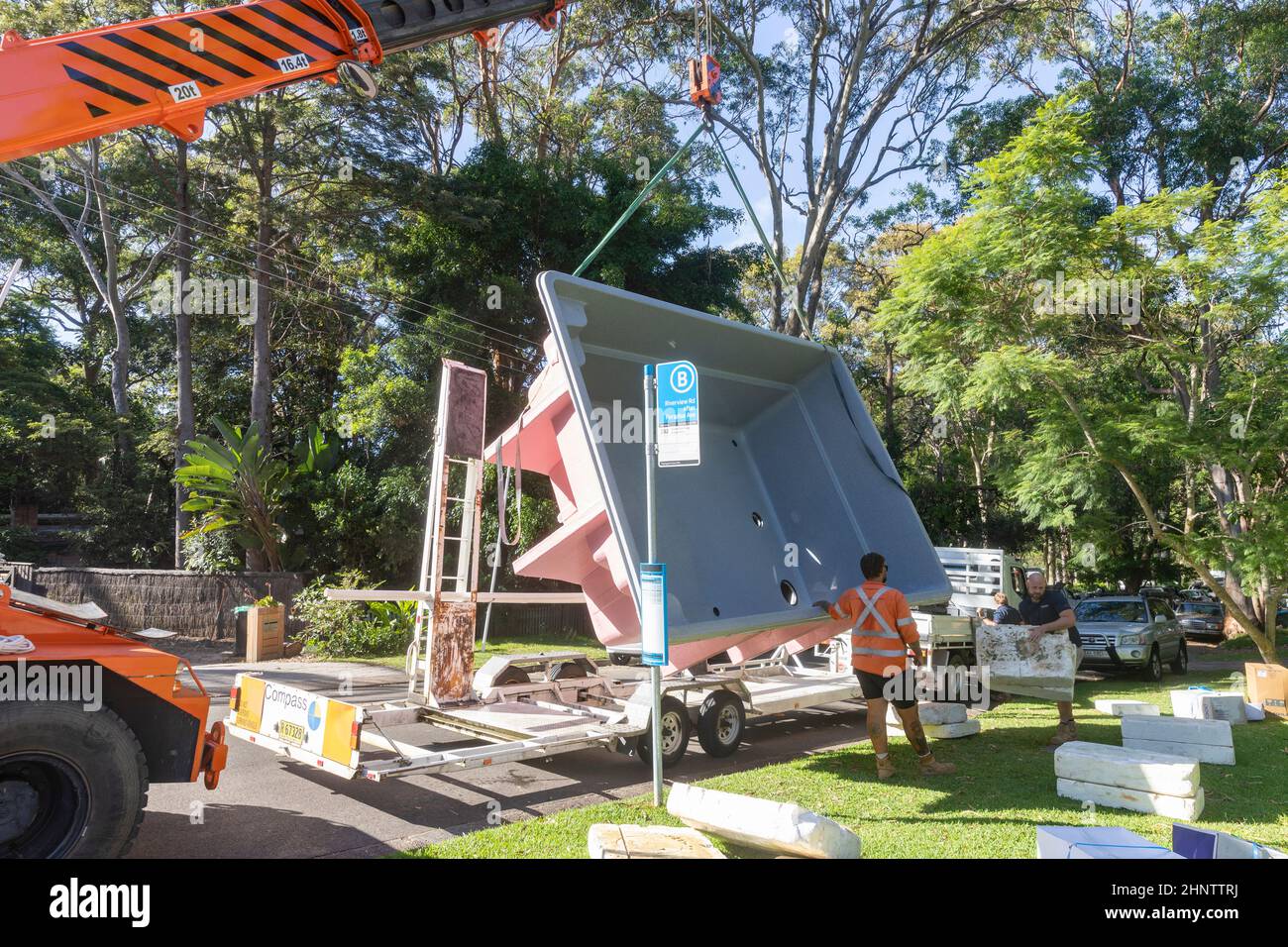 Crane lifting pool hires stock photography and images Alamy