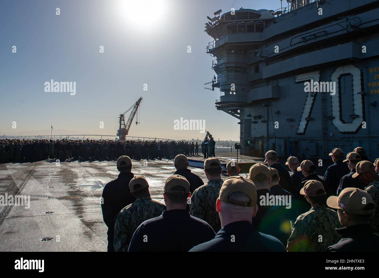 220217-N-PV401-1053  SAN DIEGO (Feb. 17, 2022) ) Capt. P. Scott Miller, commanding officer of Nimitz-class aircraft carrier USS Carl Vinson (CVN 70), addresses the crew during an all-hands call on the flight deck, Feb. 17, 2022. Vinson is currently pierside in its homeport of San Diego. (U.S. Navy photo by Mass Communication Specialist Seaman Elizabeth Grubbs) Stock Photo