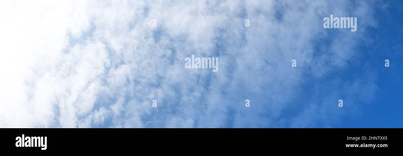Blue sky background with white clouds. Panorama Stock Photo - Alamy