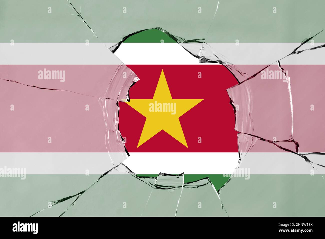 3D Flag of Suriname on a glass breakage. Stock Photo