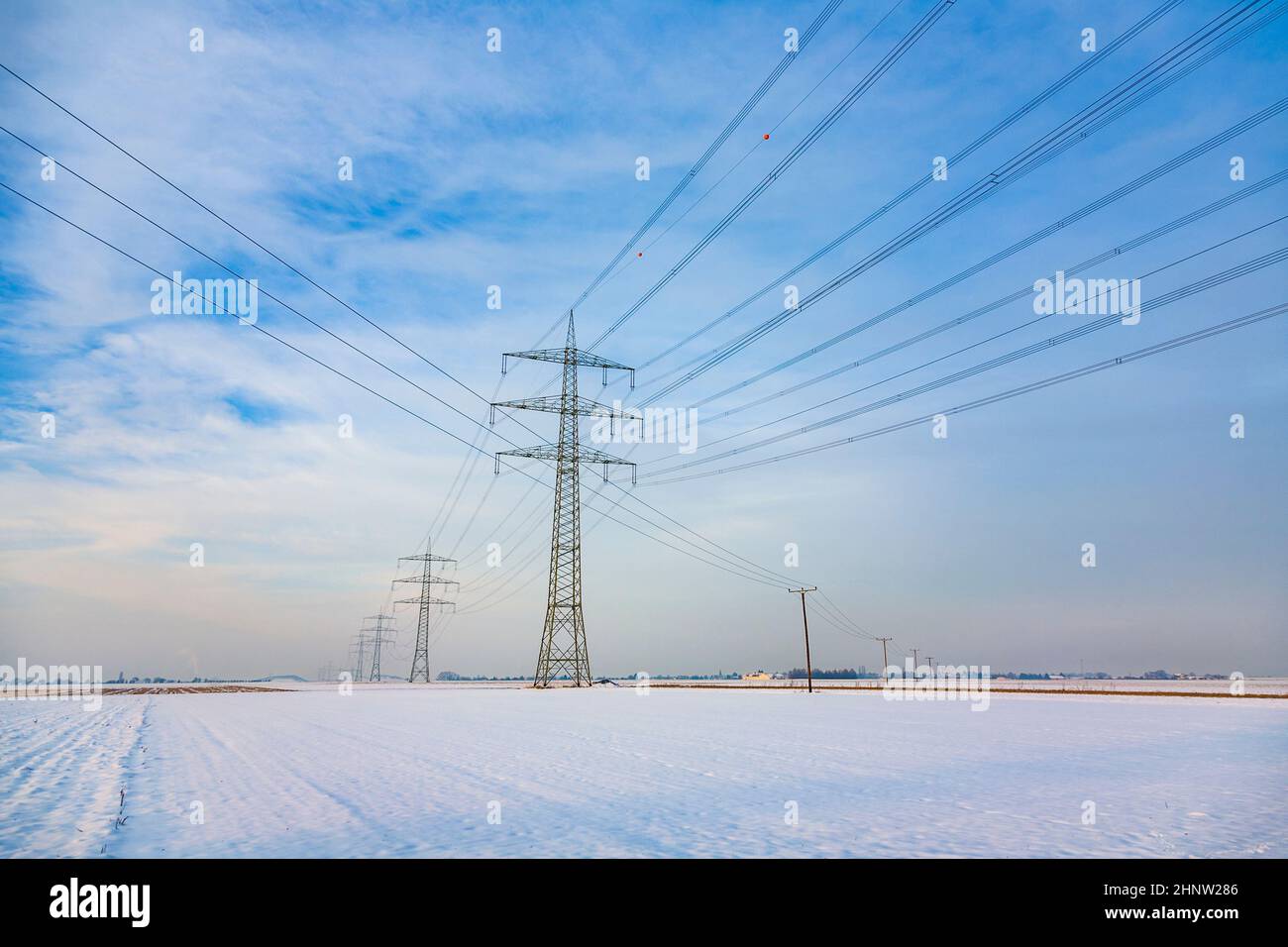 high voltage pylon tower in wintertime Stock Photo - Alamy