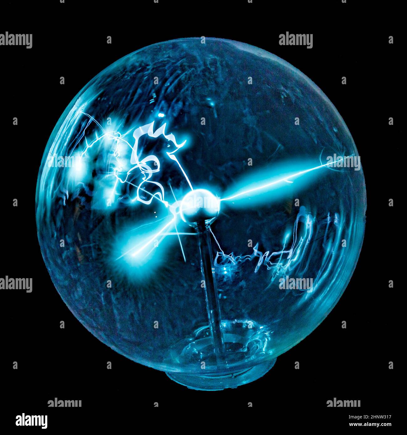 Electricity in a plasma ball as high voltage lightning Stock Photo - Alamy