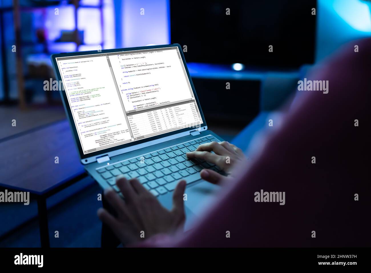Computer Programmer Using Development Software On Laptop Stock Photo ...