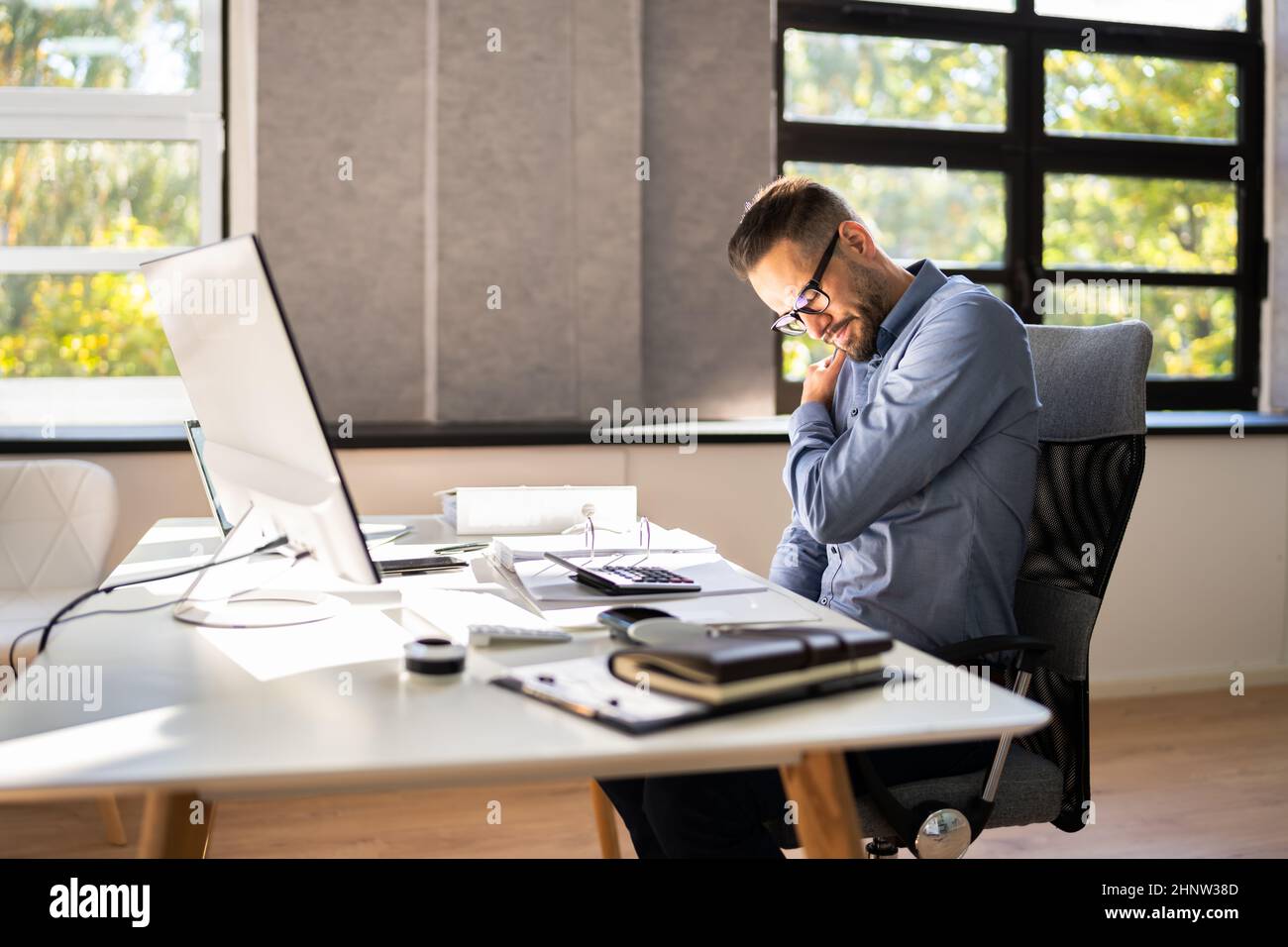 Ergonomic Computer Chair Bad Posture And Pain Stock Photo Alamy